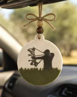 Handmade bow hunter freshie, a country-western scented aroma bead car air freshener shaped with an archery deer-hunting design, hanging from a rearview mirror.