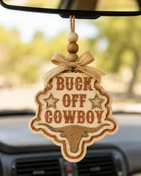 Western Buck Off Cowboy car freshie shaped like a bucking bull rider cowboy, a handmade aroma bead air freshener hanging from a rearview mirror for country and rodeo fans.