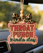 Handmade boxing-glove shaped scented car freshie with funny "Throat Punch Kinda Day" text, a sarcastic aroma-bead car air freshener hanging from a rearview mirror.