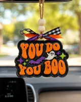 Handmade You Do You Boo car freshie, a sassy quote scented aroma bead air freshener with a trendy western country design hanging in a car.