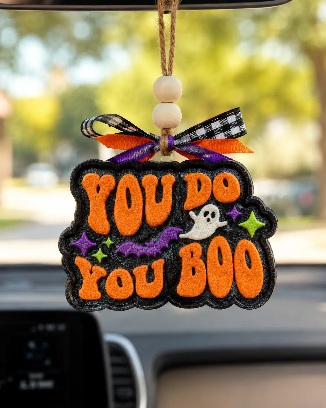 Handmade You Do You Boo car freshie, a sassy quote scented aroma bead air freshener with a trendy western country design hanging in a car.